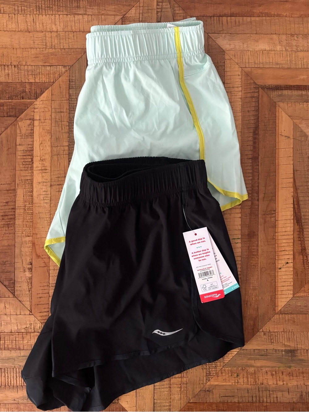 (2) Women's Saucony Outpace 3” one Light Green one Black